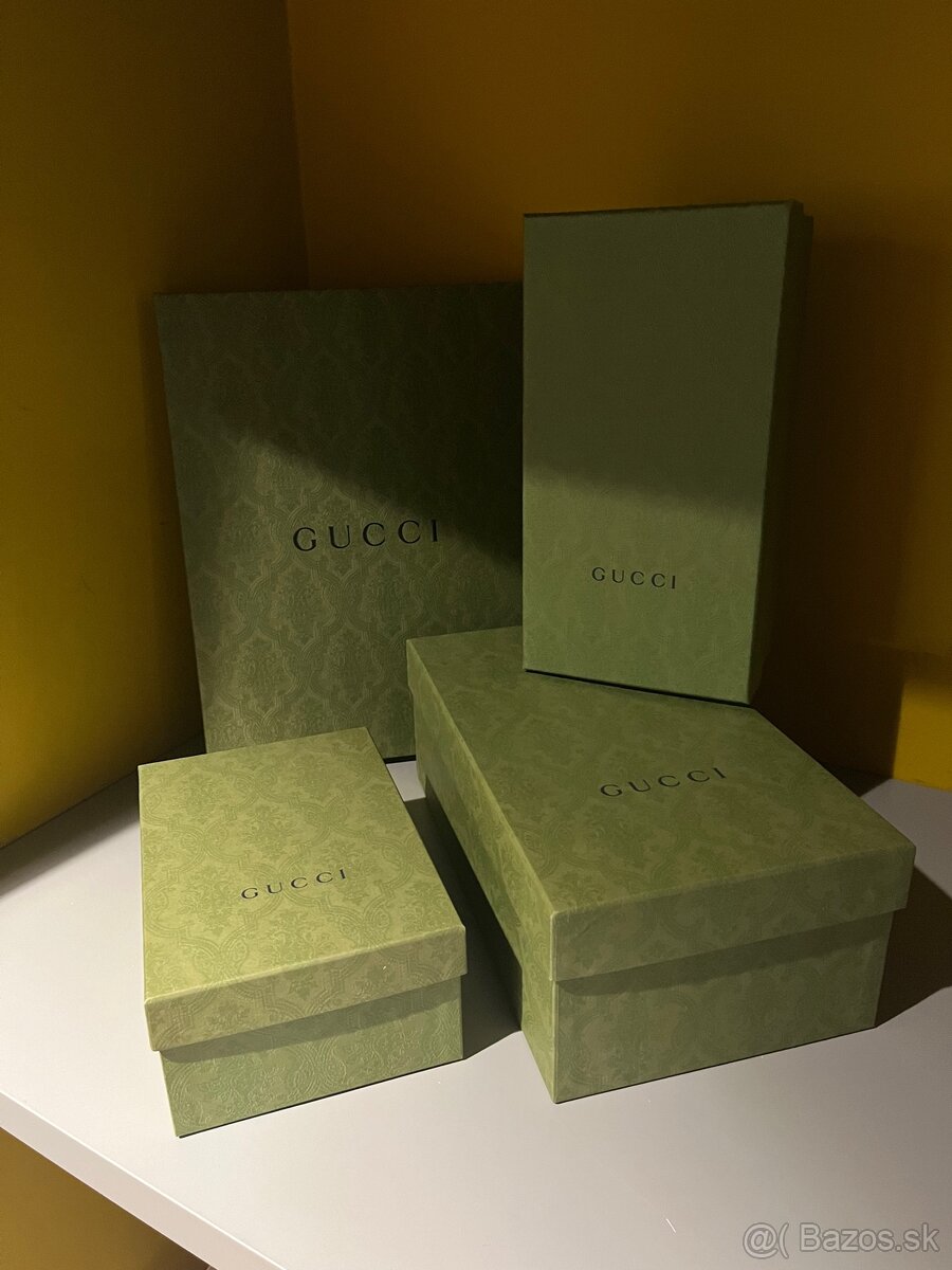 Gucci krabice a tašky
