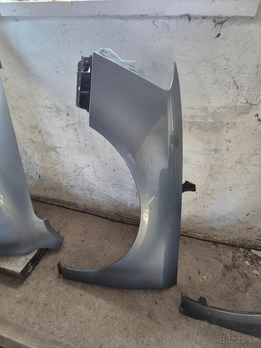 Blatník VW Passat b7