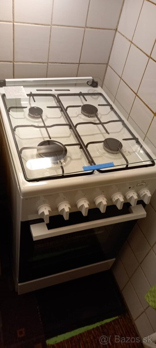 Vrchné, sklopné sklo na sporák ELEKTROLUX LKK560000.
