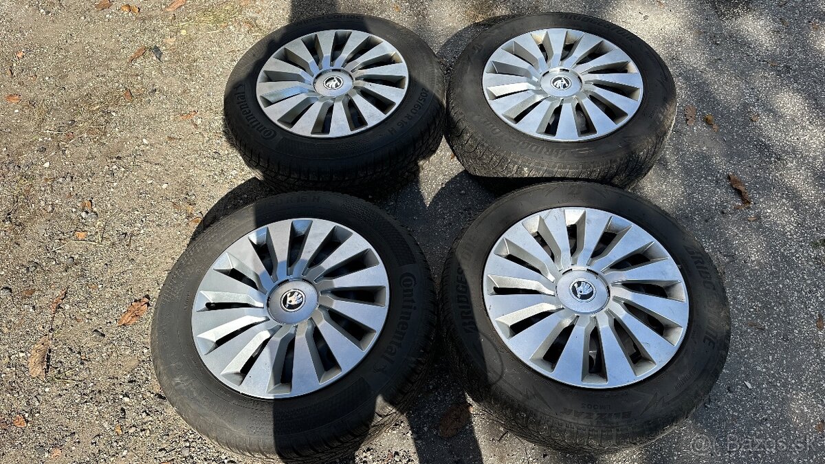 11.	Skoda Octavia plechove 205/60 r16 zimne + puklice