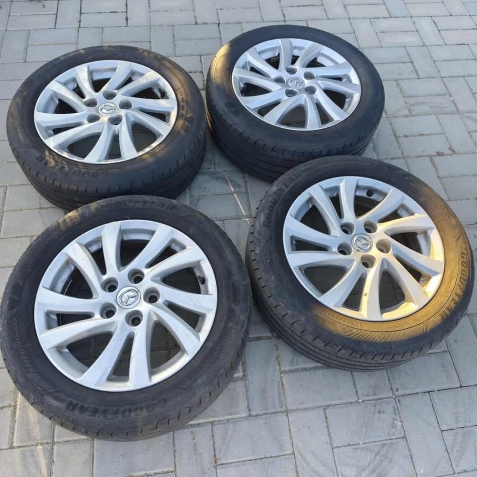 16" alu MAZDA + letné pneu originál.
