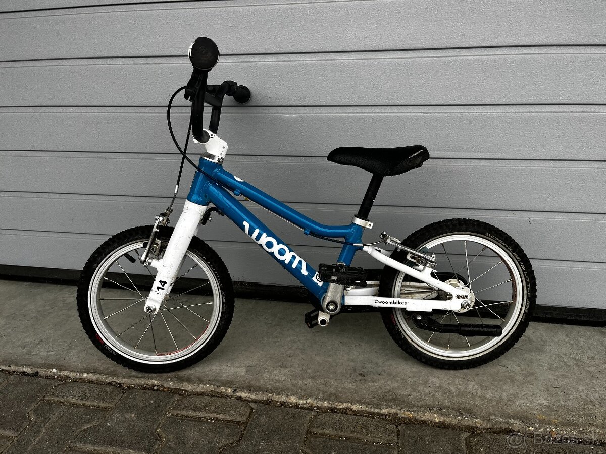 predám modrý bicykel WOOM 2