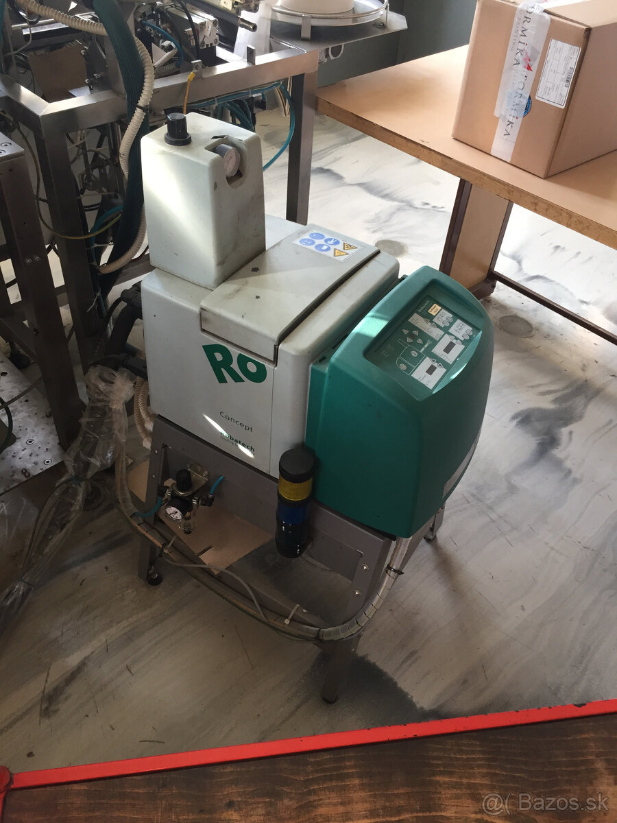 Aplikátor nánosu lepidla Robatech