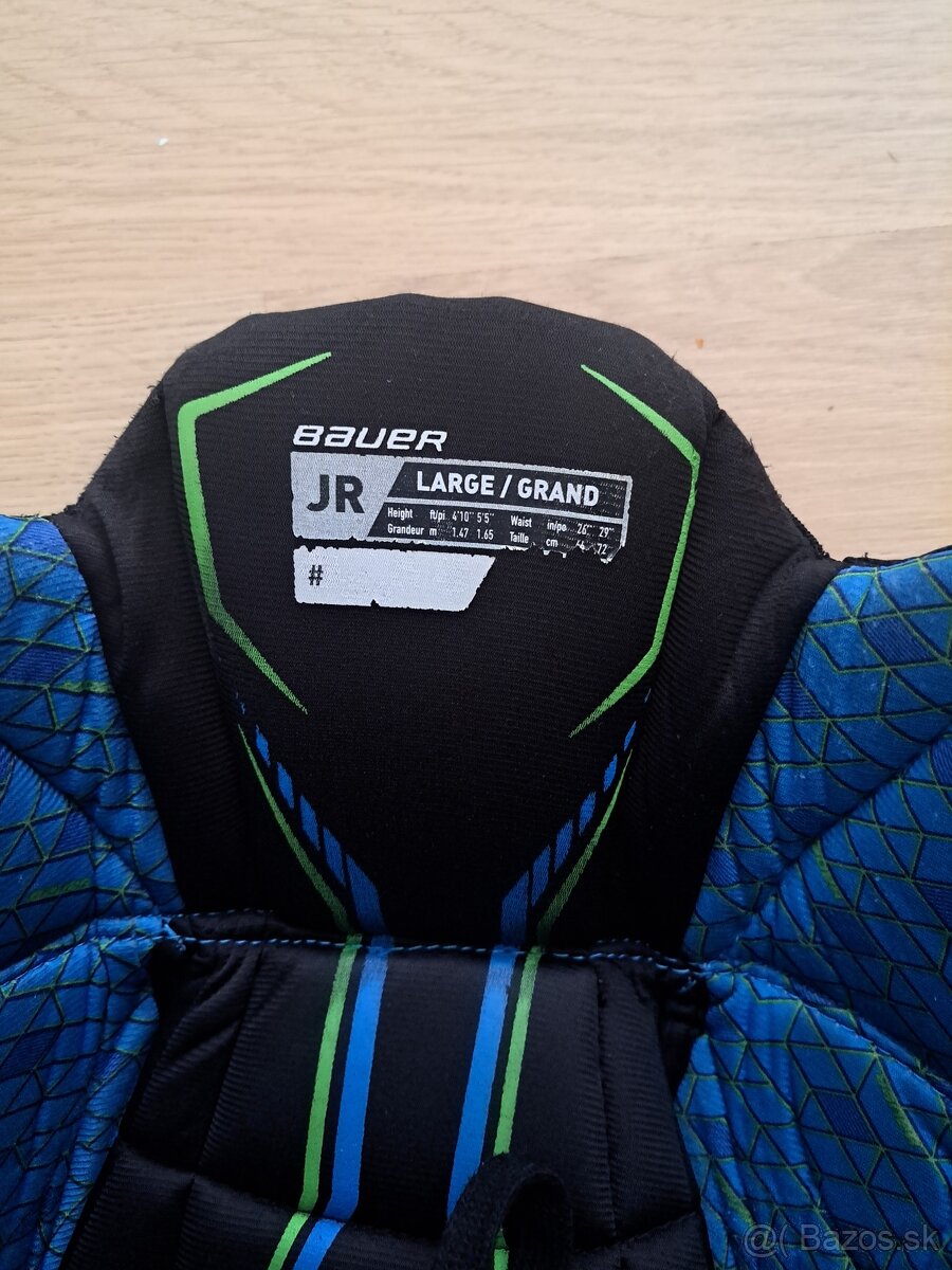 Hokejové nohavice Bauer.