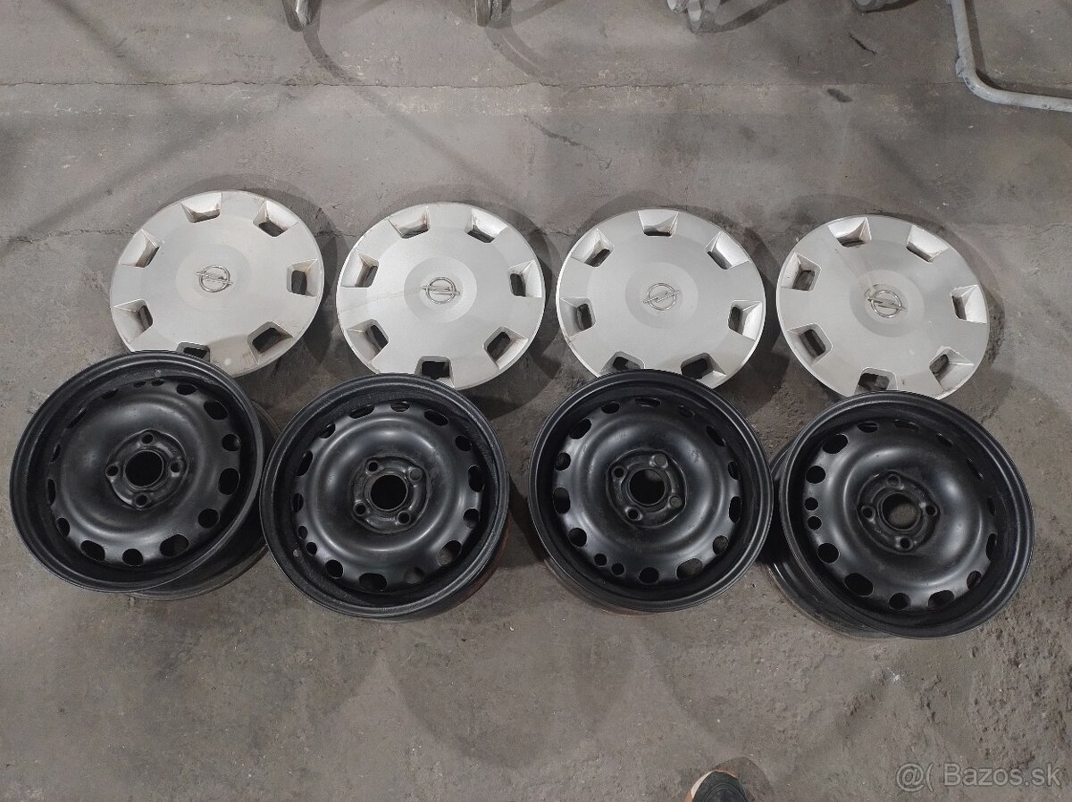 Plechové disky GM 4x100 R14 ET 49 plus puklice