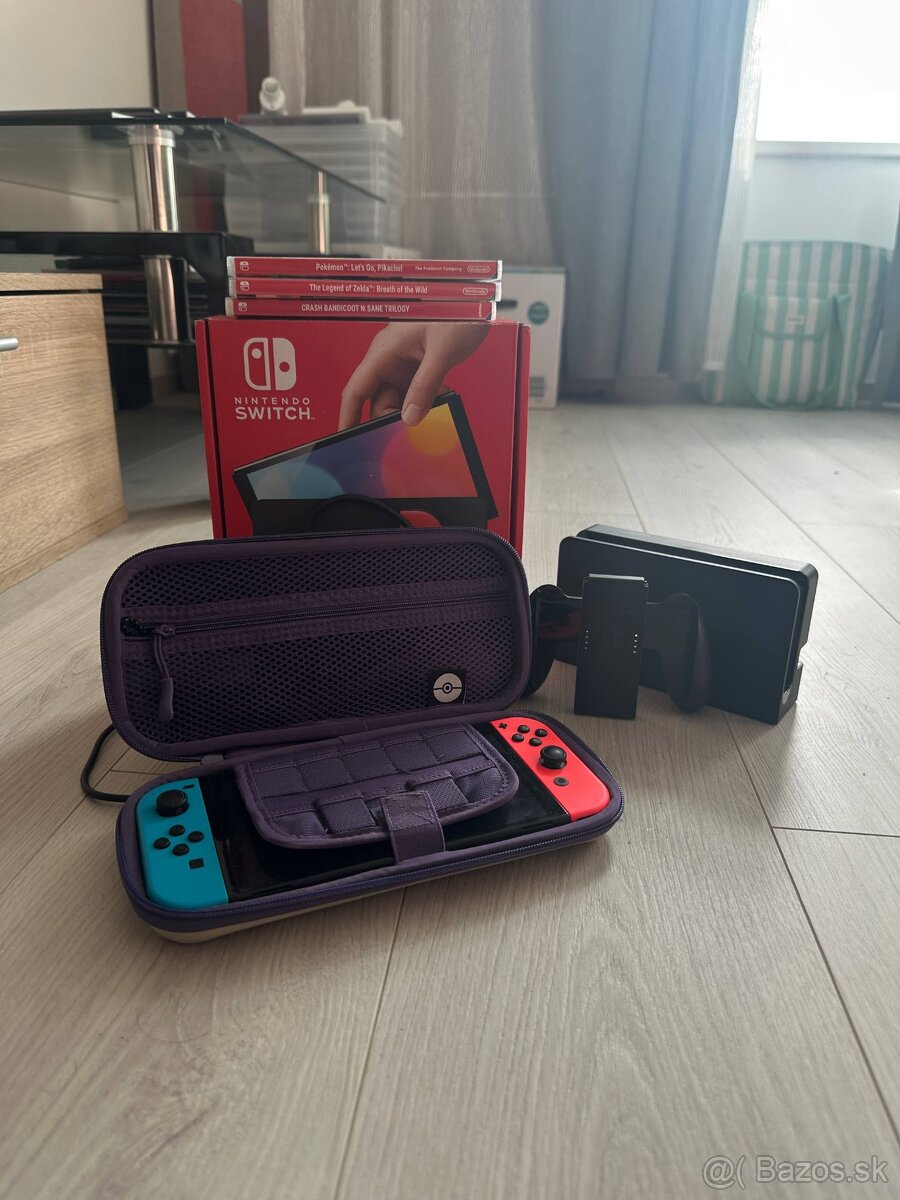 Nintendo Switch + Box + 3 hry