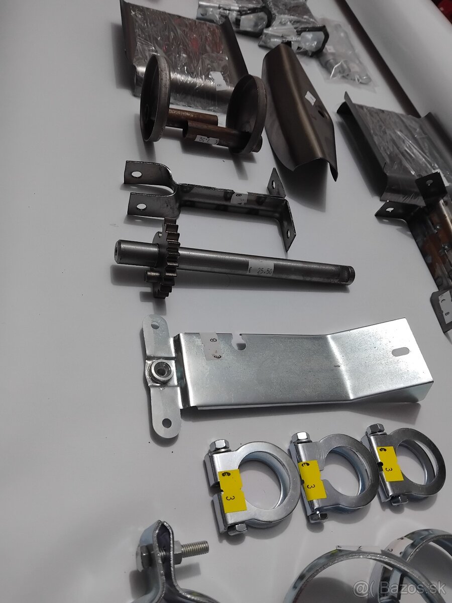 DIELY,SÚČIASTKY JAWA PIONIER 50 - OBJIMKA VÝFUKU STUPAČKY HT