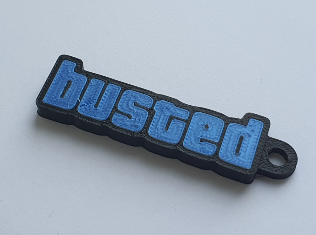 Busted - kľúčenka