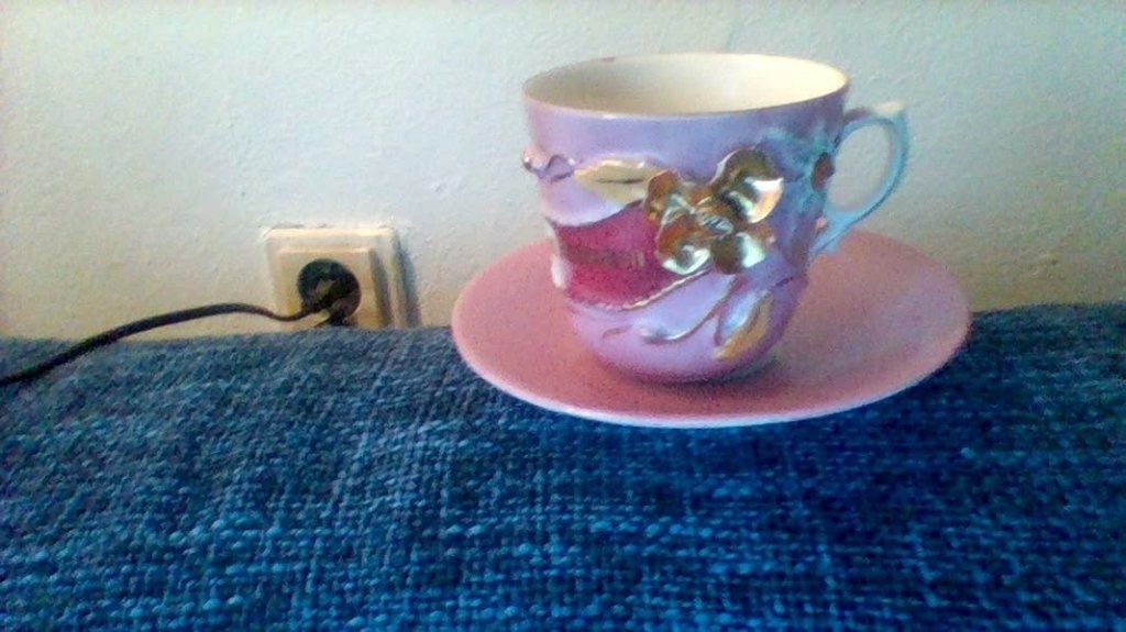 starý porcelánový hrnček...