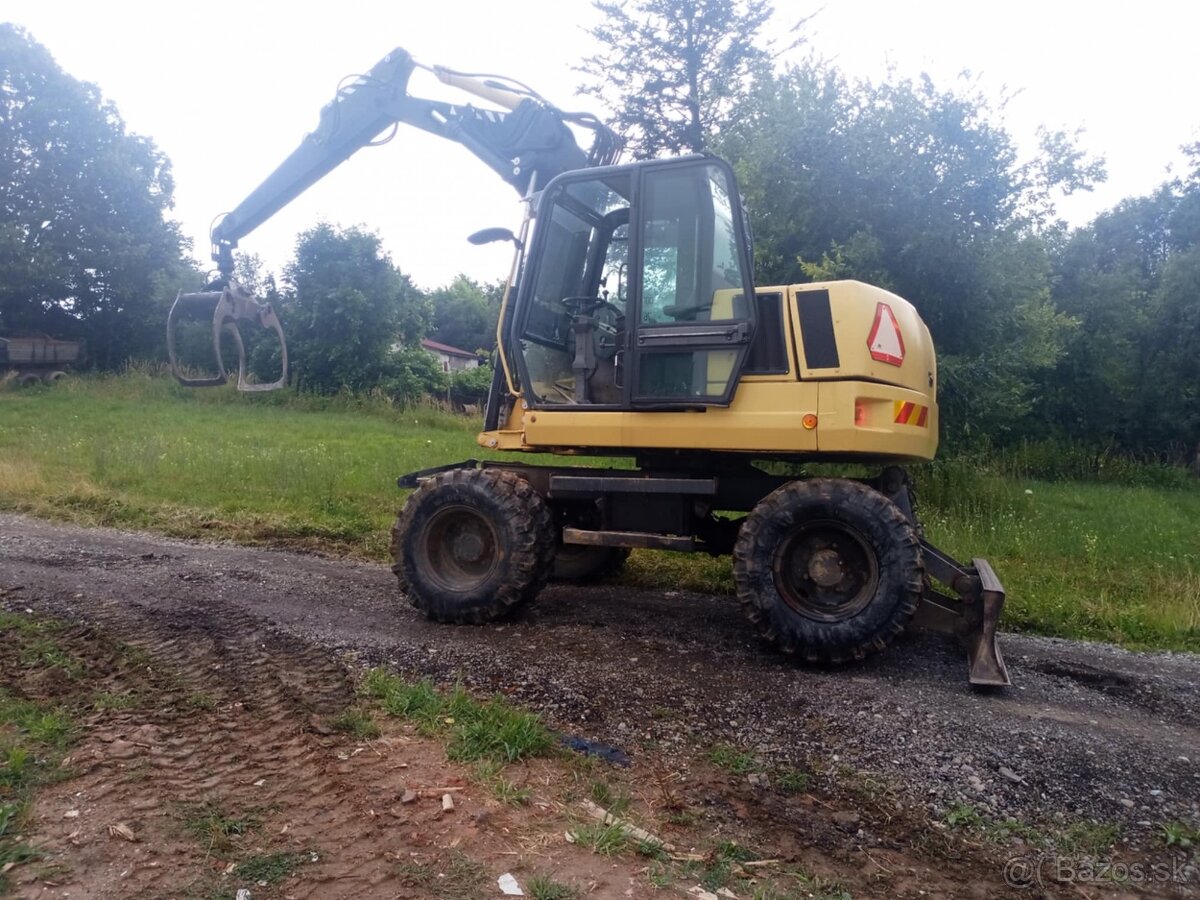 Predám kolesový bager fiat hitachi fh 115