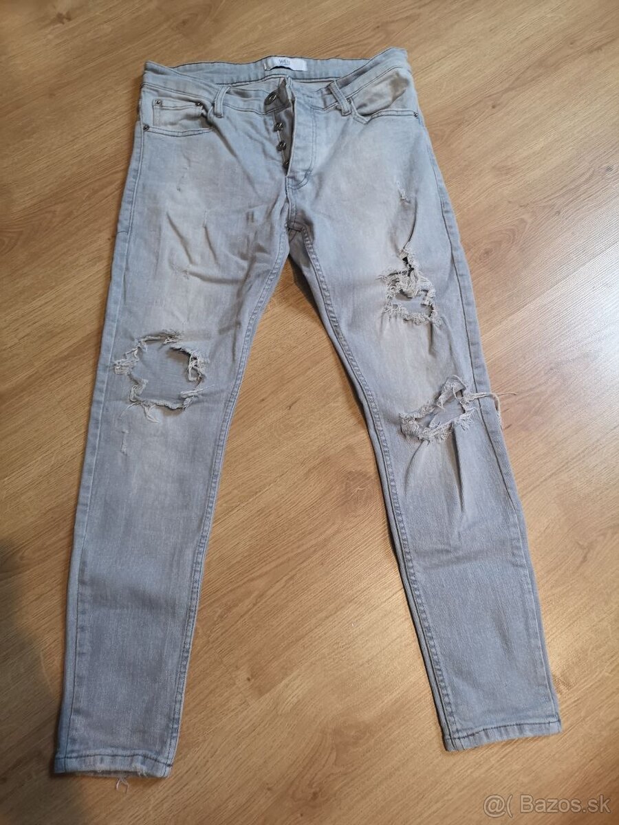 Roztrhané pánske džínsy