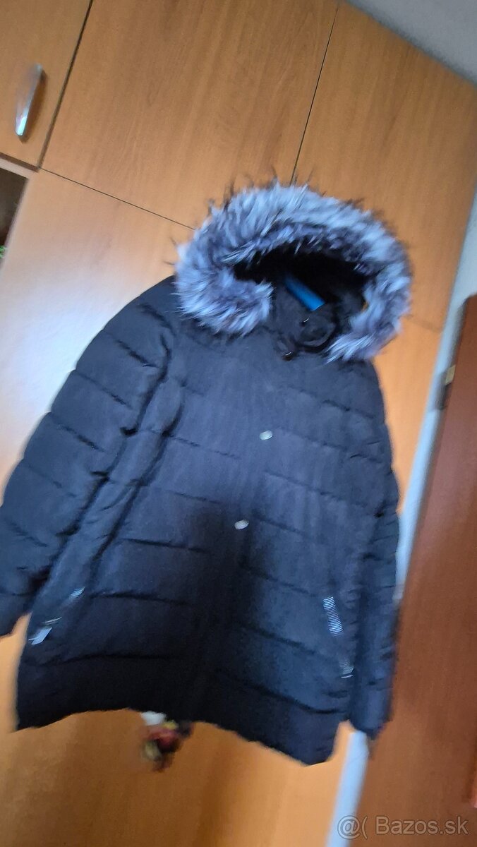 Damska vetrovka tepla s kapycnou 48ka