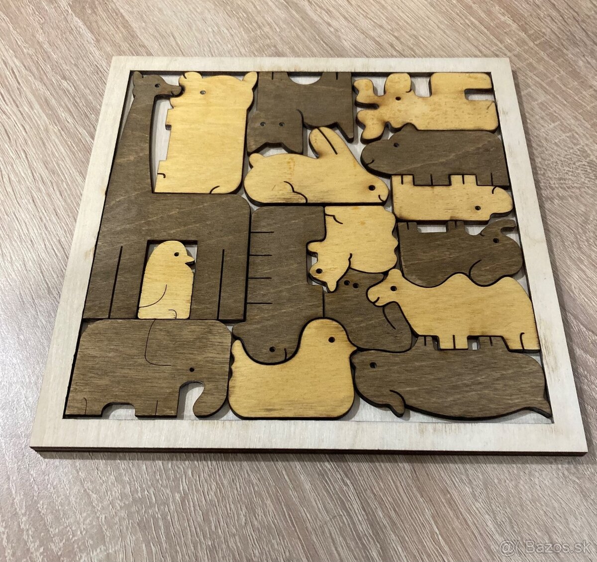 Krásne drevené puzzle so zvieratkami, ktoré do seba pasujú