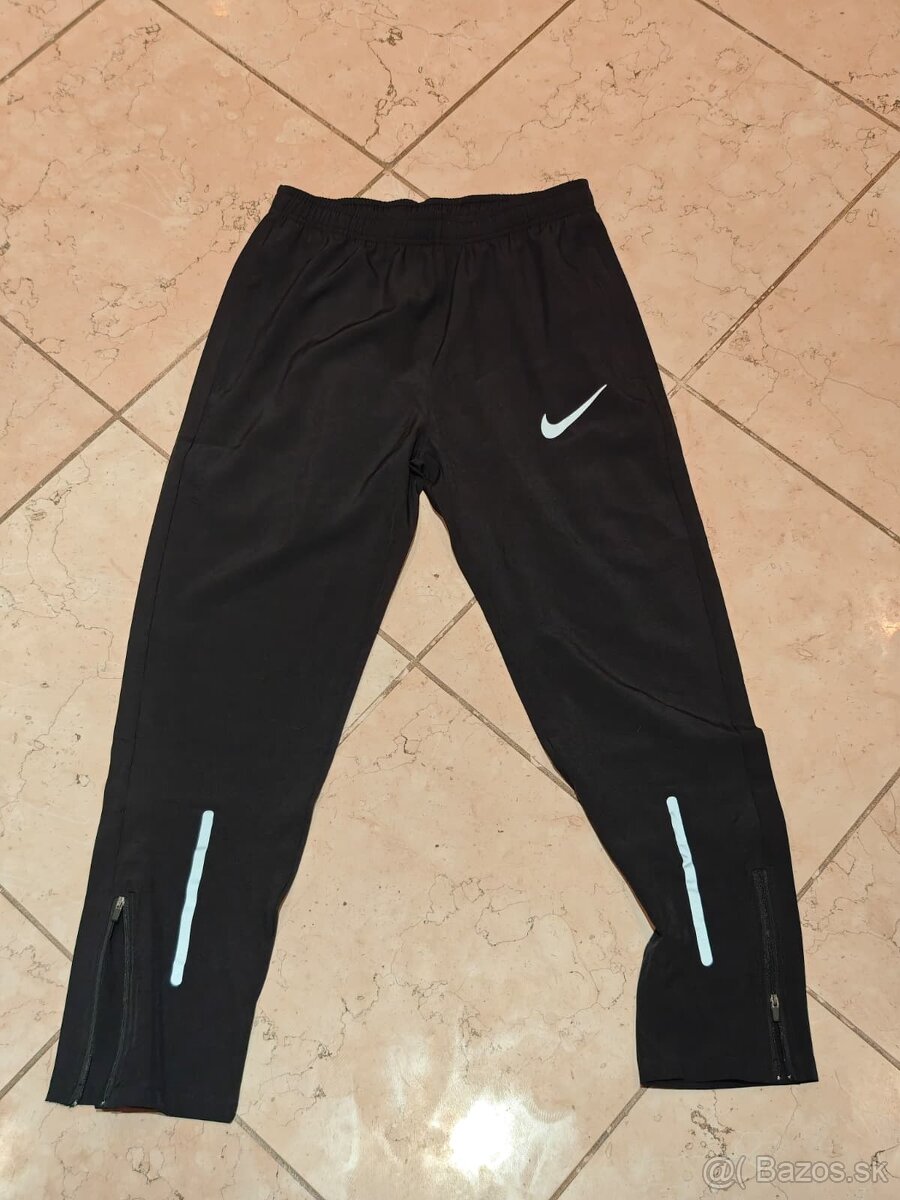 NIKE AeroSwift tepláky na behanie