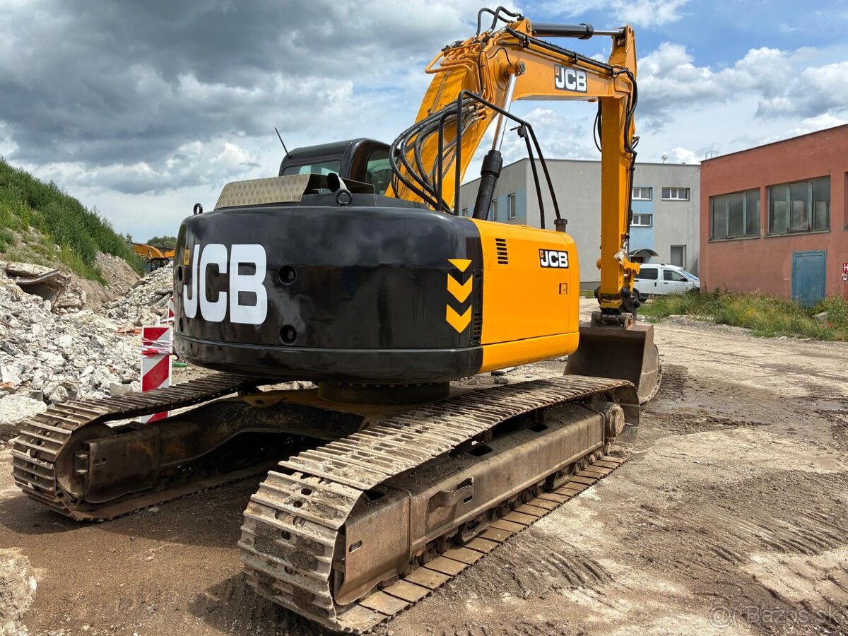predám pásový báger JCB 235LC