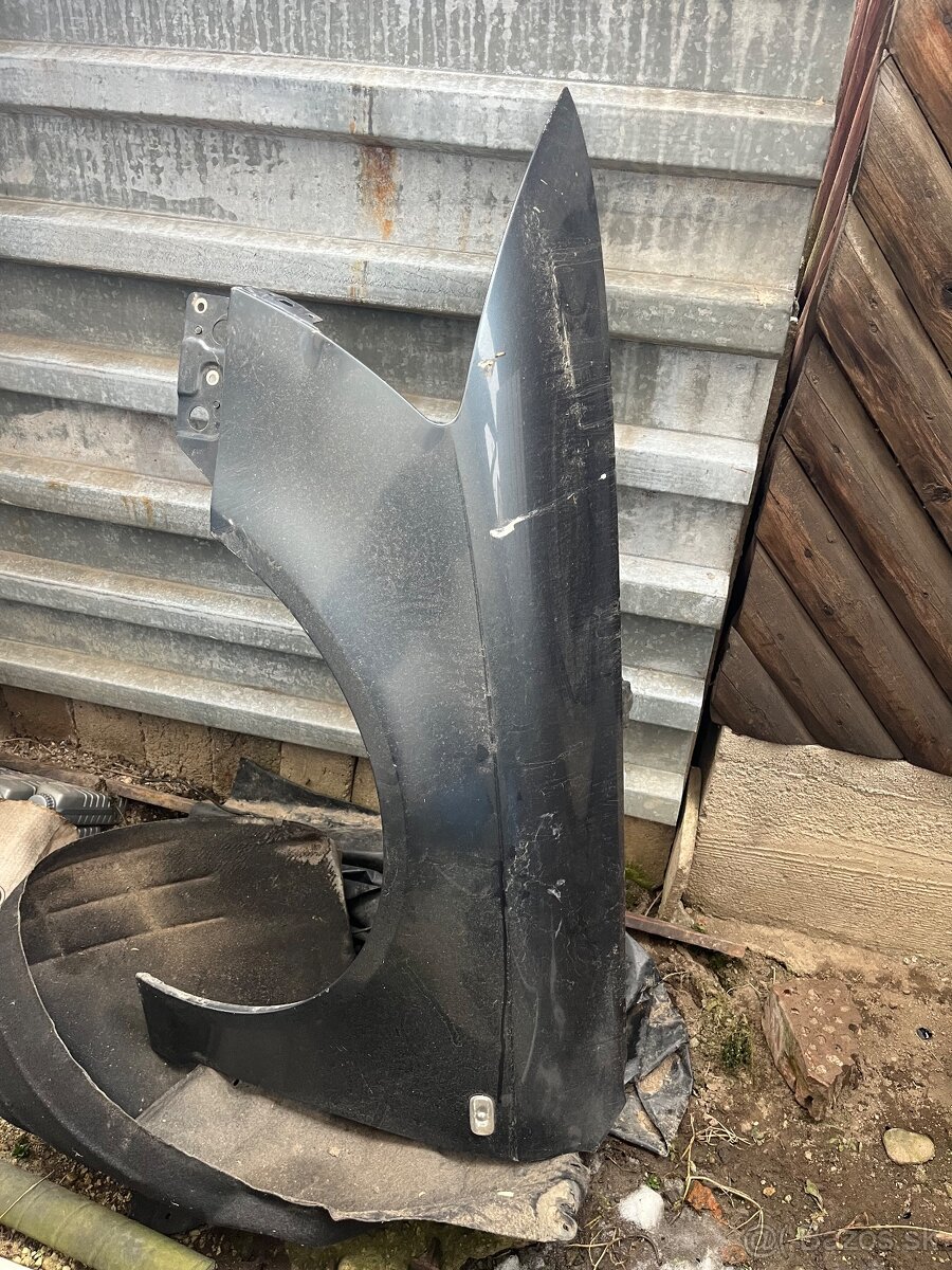 Predny lavy blatnik Audi a6 c6