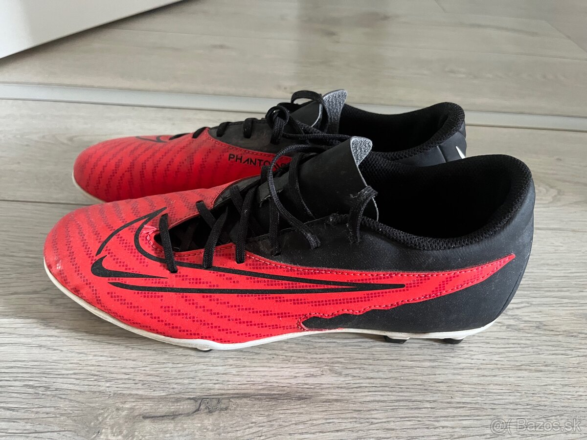 Vysoke nepremokave Lotto a kopacky Nike