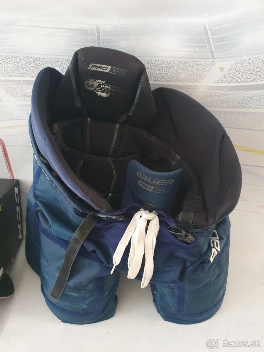použite hokejové profi nohavice BAUER PRO - navy L