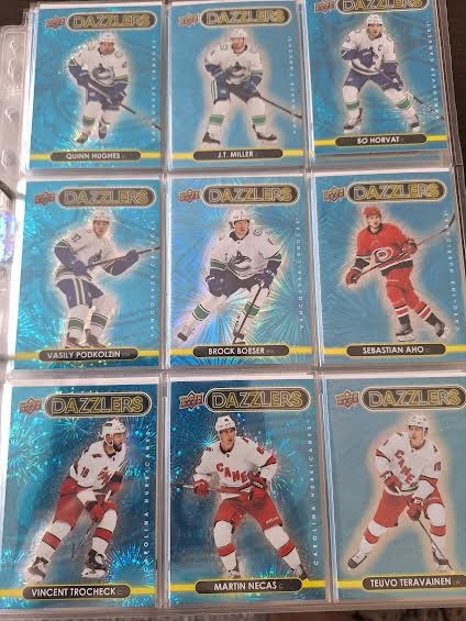 Hokejové kartičky insert dazzlers blue 2021/22 .
