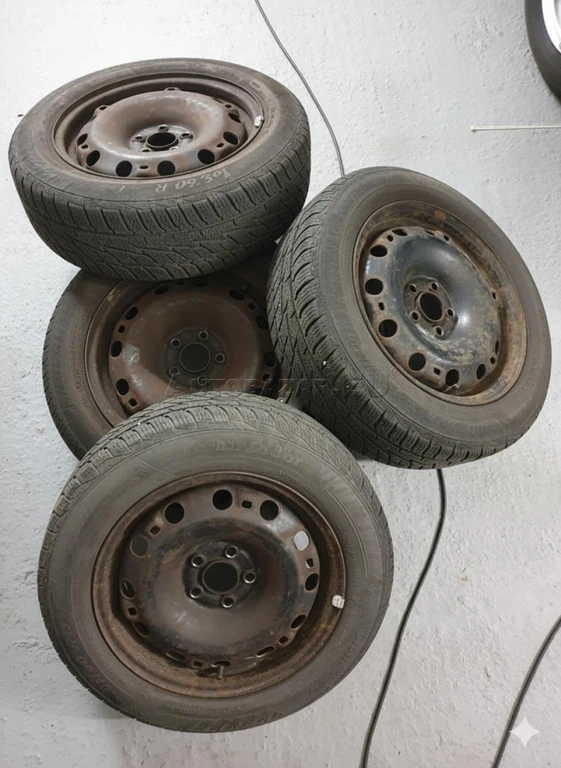 Zimne na diskoch 5x100 185/60R15 vw,seat,škoda