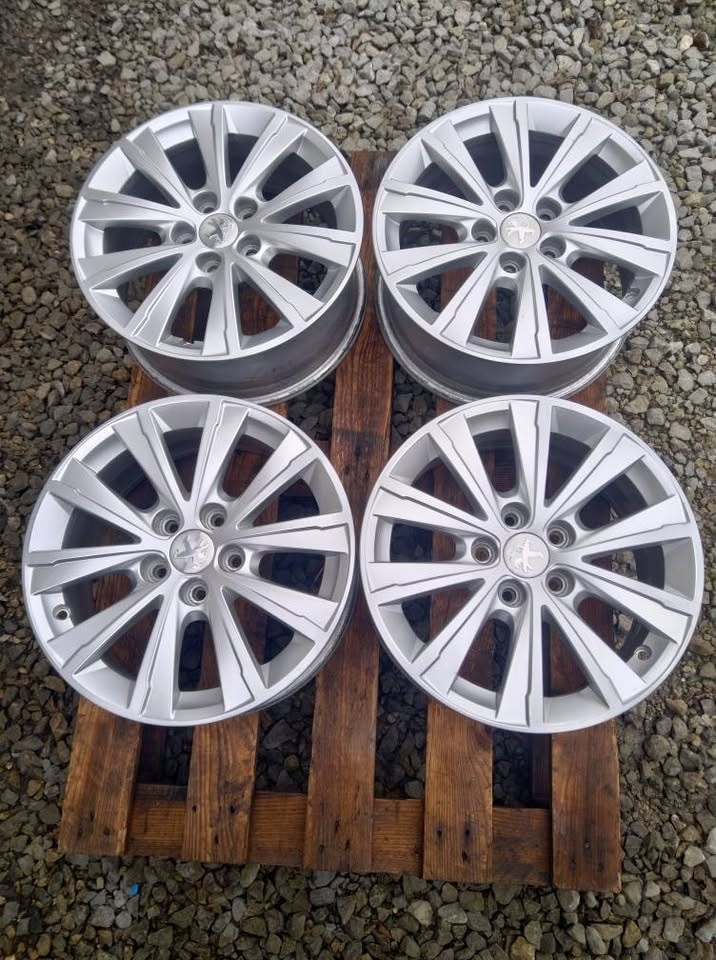 Alu Peugeot 16" originál.
