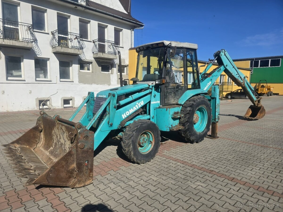 Koparko ładowarka Komatsu 95 rypadlo
