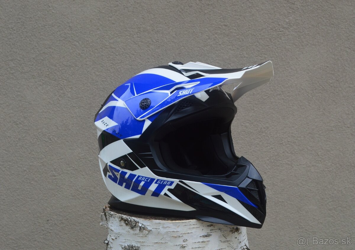 juniorská detská prilba okuliare shot bielo modrá