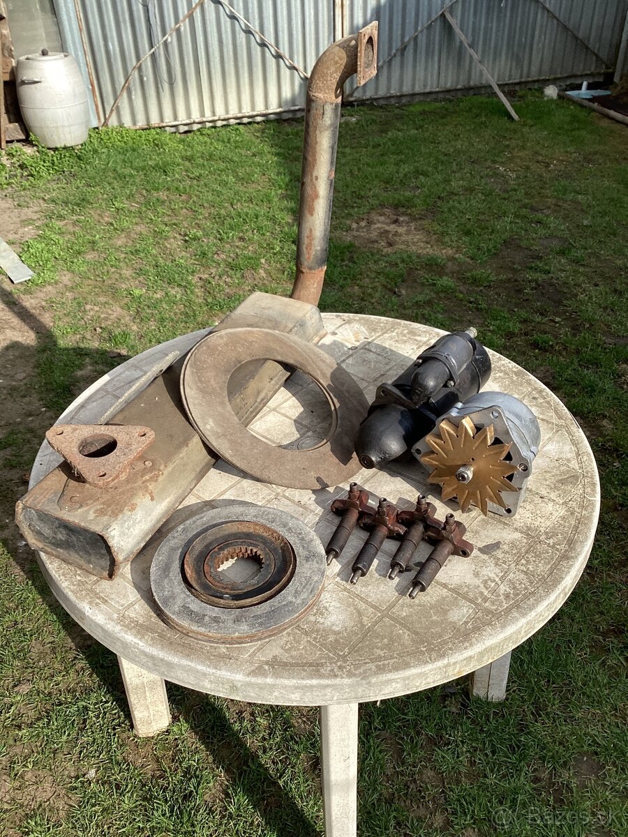 Kryštál štarter,alternator,výfuk,trysky,