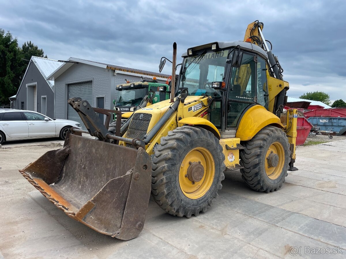 Traktorbager new holland 115b
