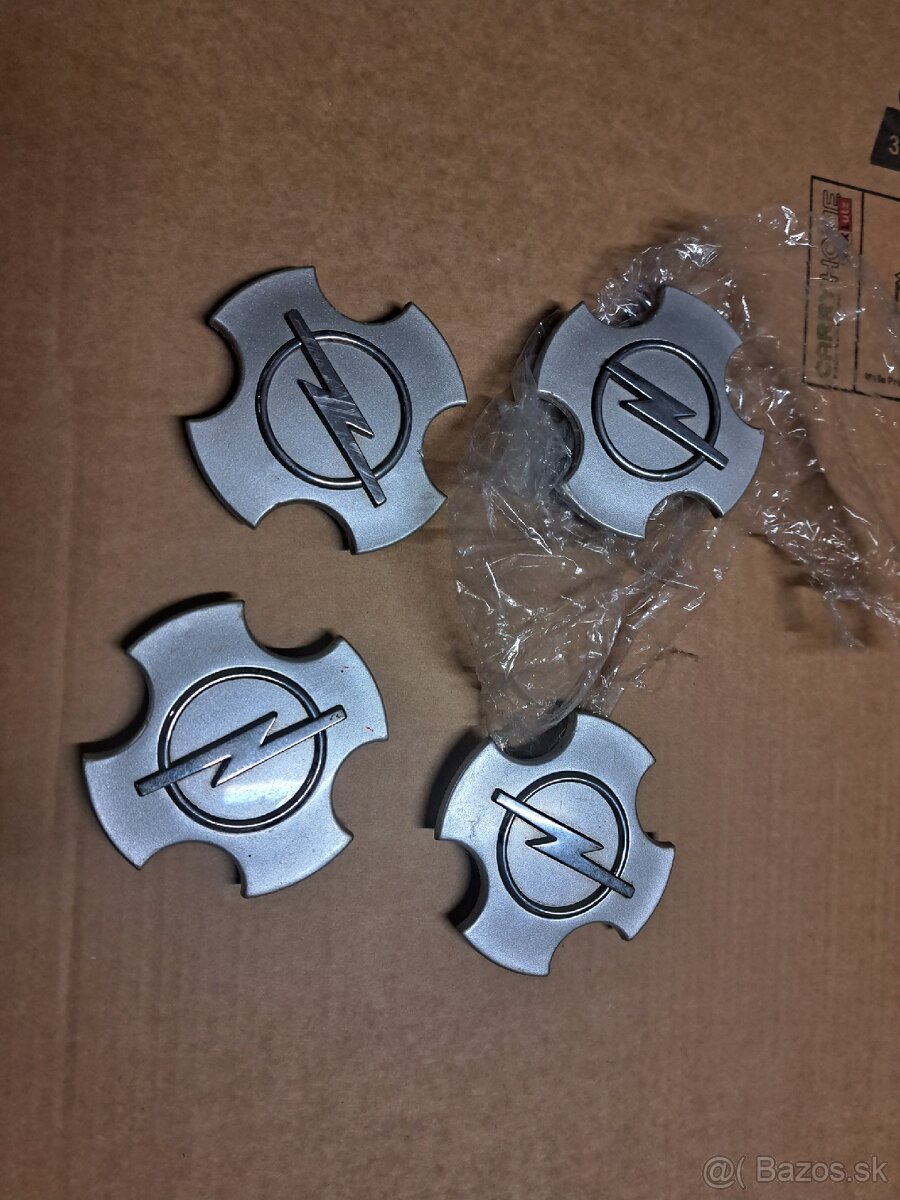 Opel originál stredové krytky kolies.