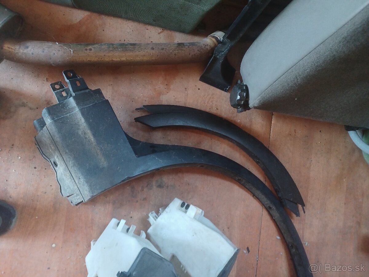 Bmw x3 e83 lemy blatníkov a nádobka ostrekovačov