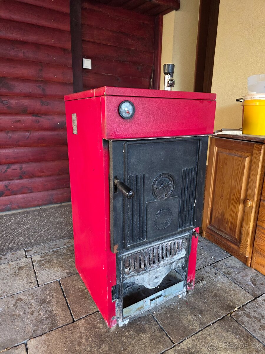 LIATINOVY KOTOL NA TUHE PALIVO