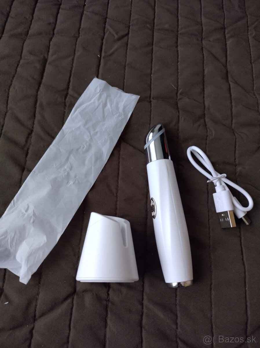 nielen cestovny masážny prístroj na očné okolie a pery.