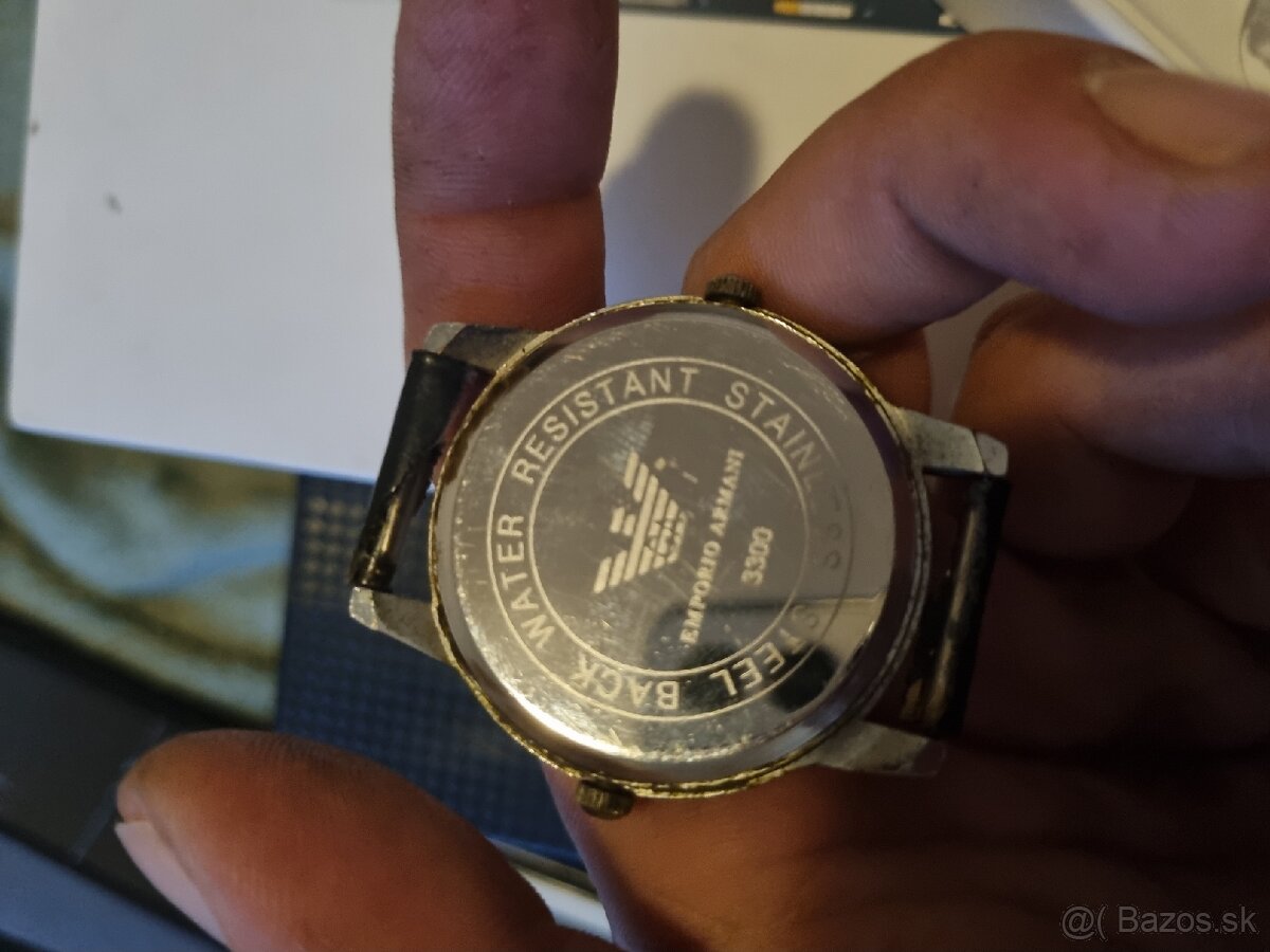 Hodiny Amporio a Rolex