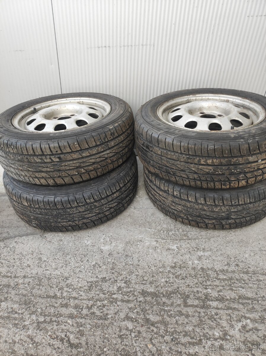 Predám plechové disky 4x100 s pneu 180/60 R14