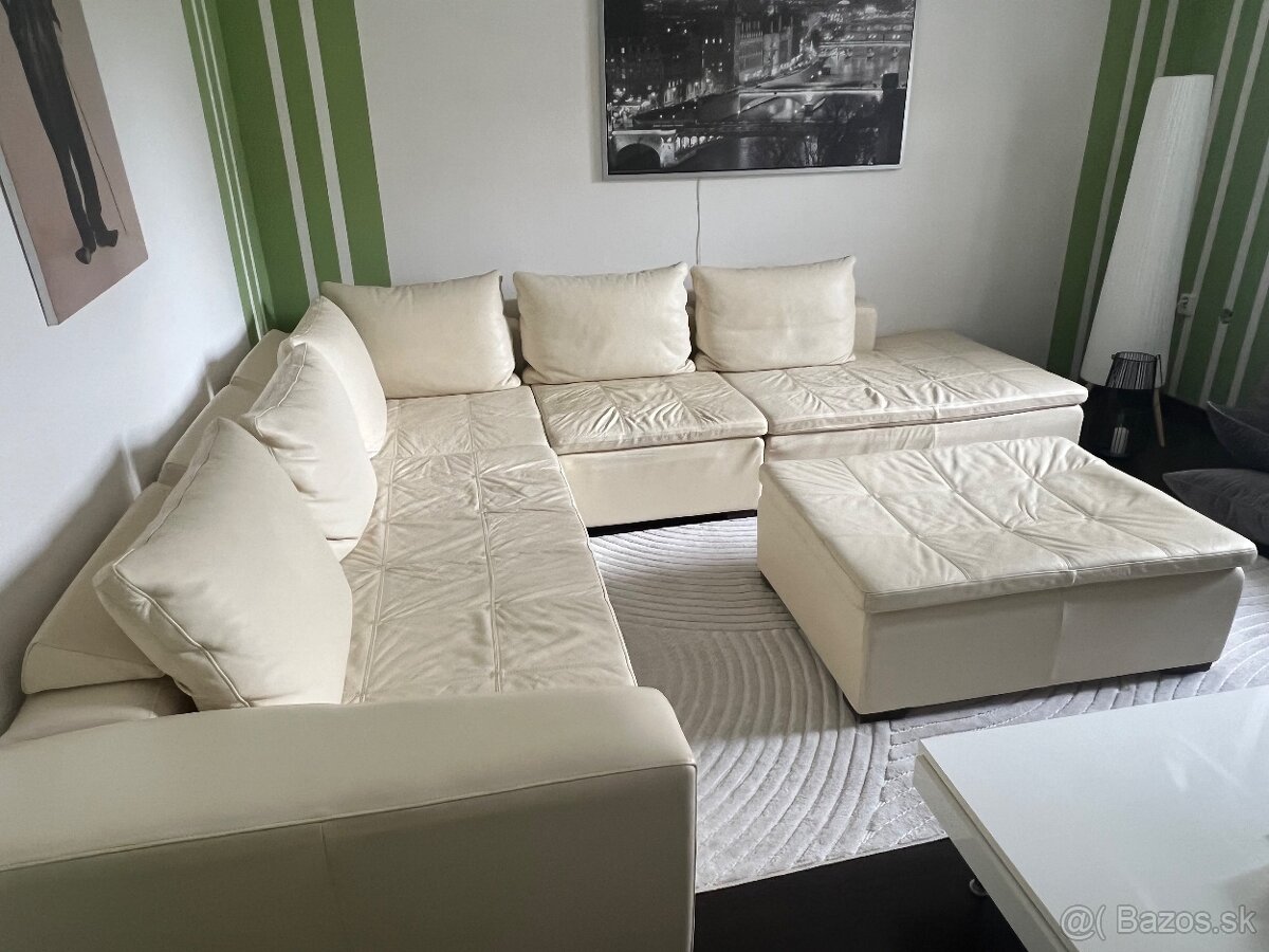 Rohová kožená sedačka s taburetkou