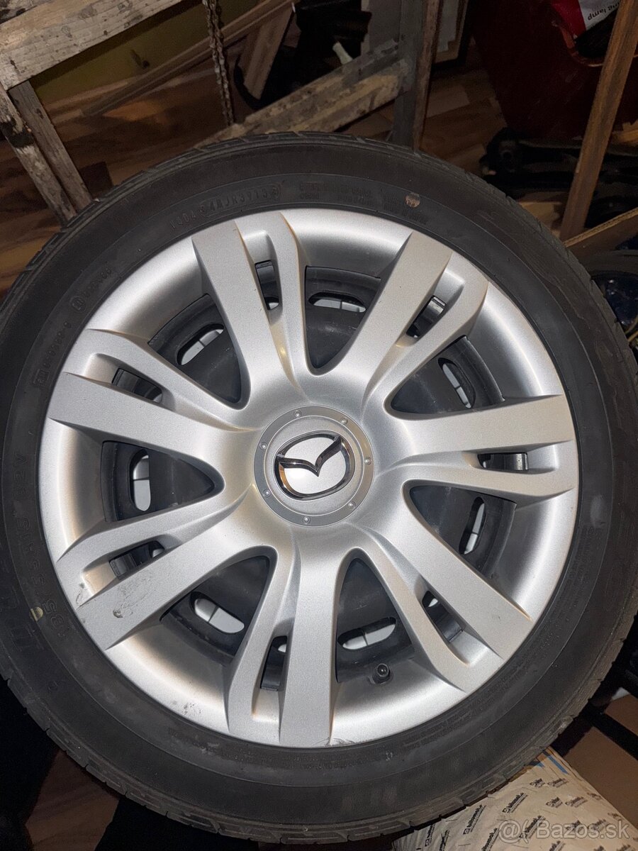 Mazda letne pneumatiky s diskami a puklicami