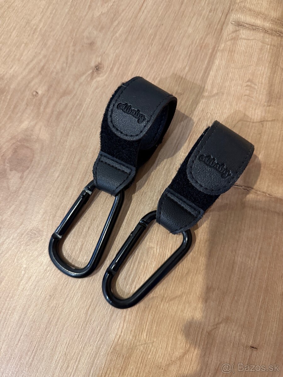 Úchytky na tašku na kočík