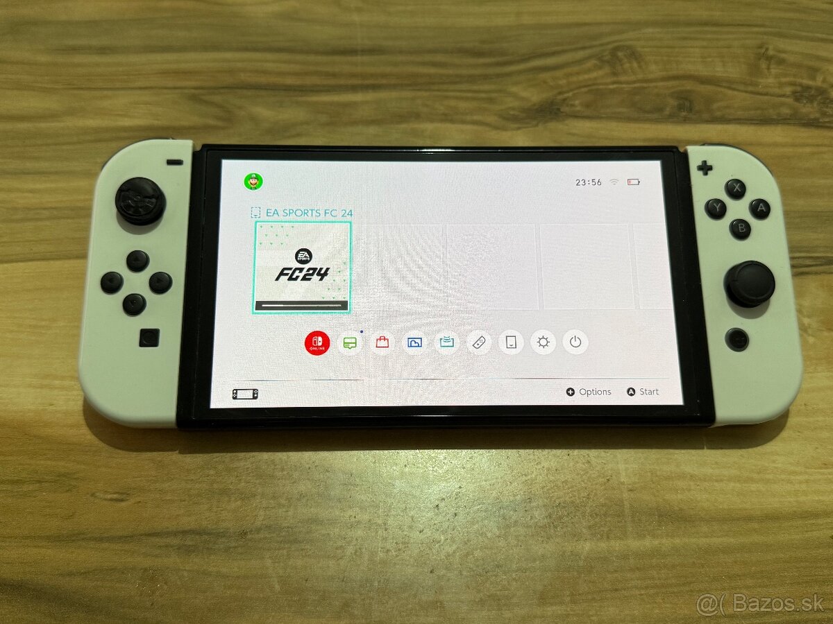 Predám Hernú konzolu Nintendo Switch Oled Bežné Známky