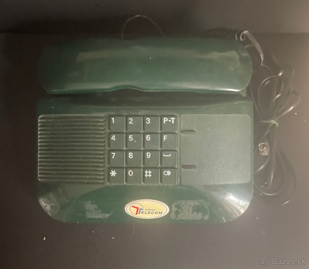 Tlačítkový telefón