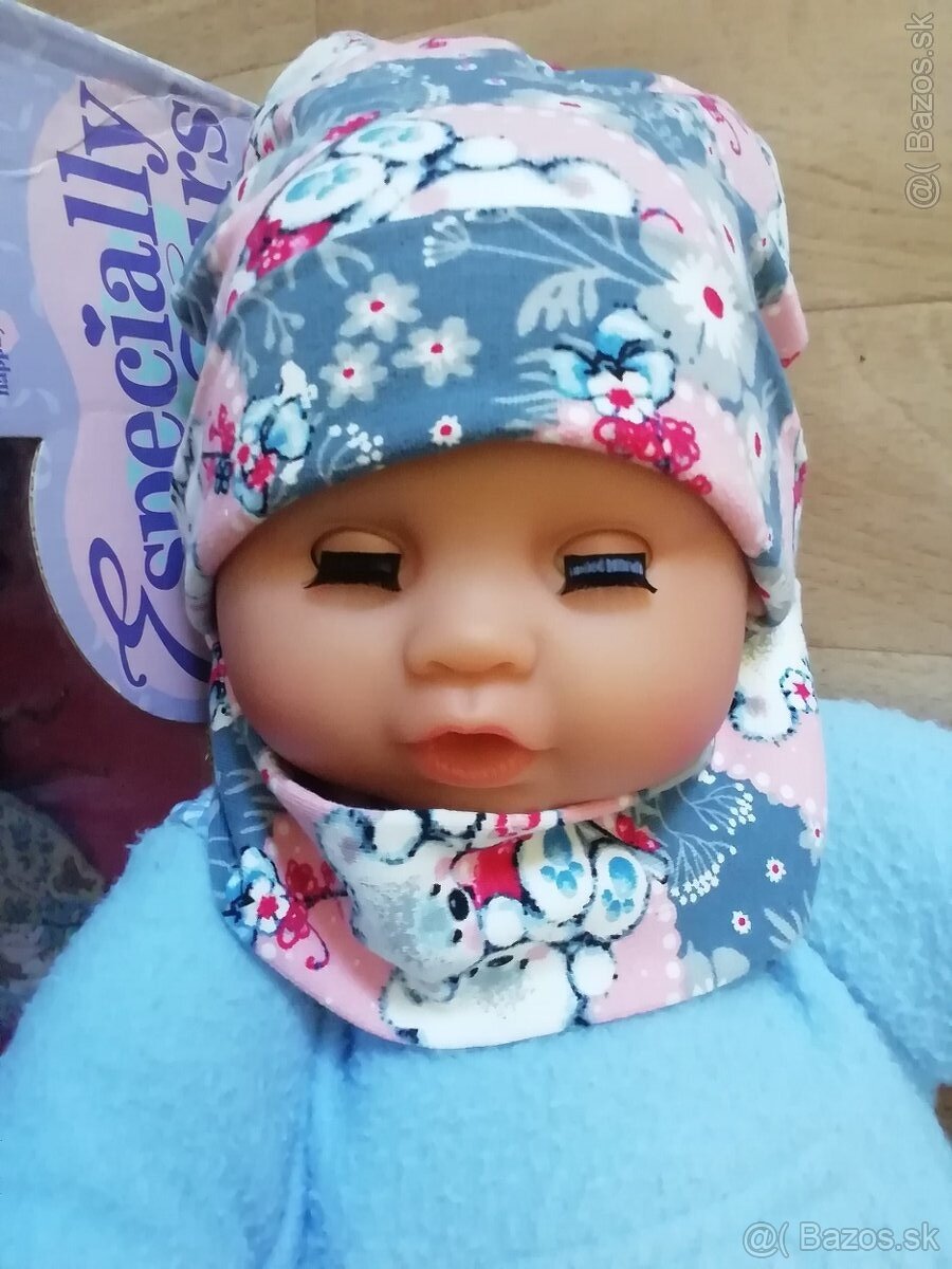 Babika s funkciami a s macikovym oblecenim