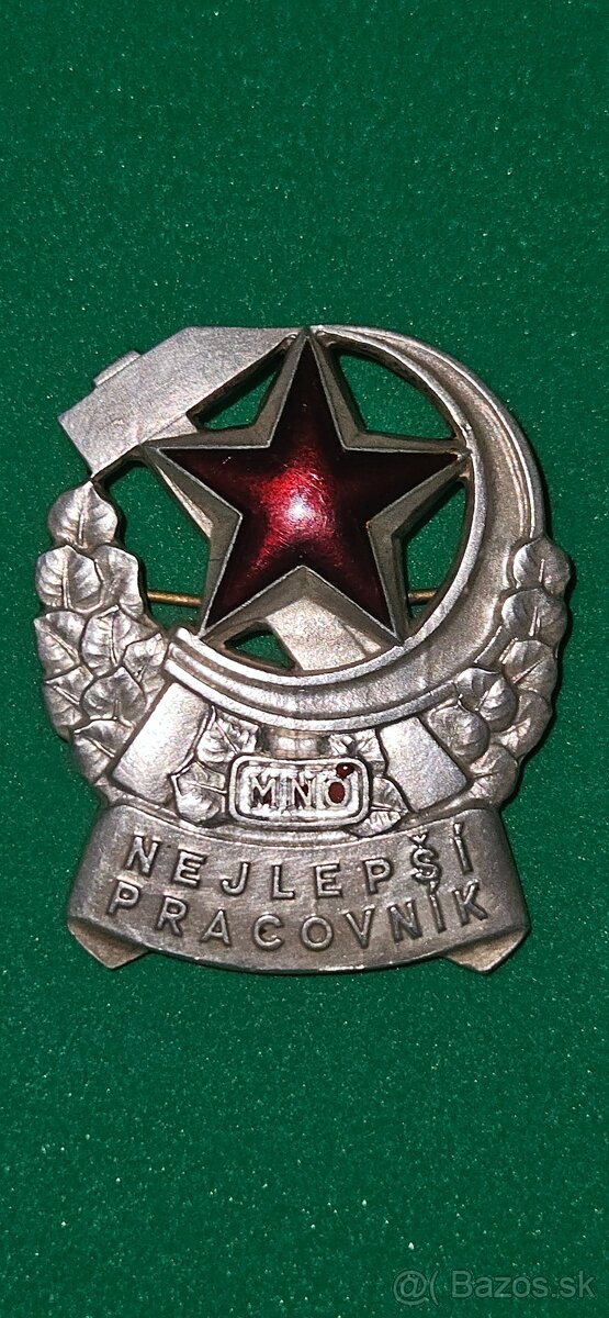 Strieborná medaila "nejlepší pracovník" 1957