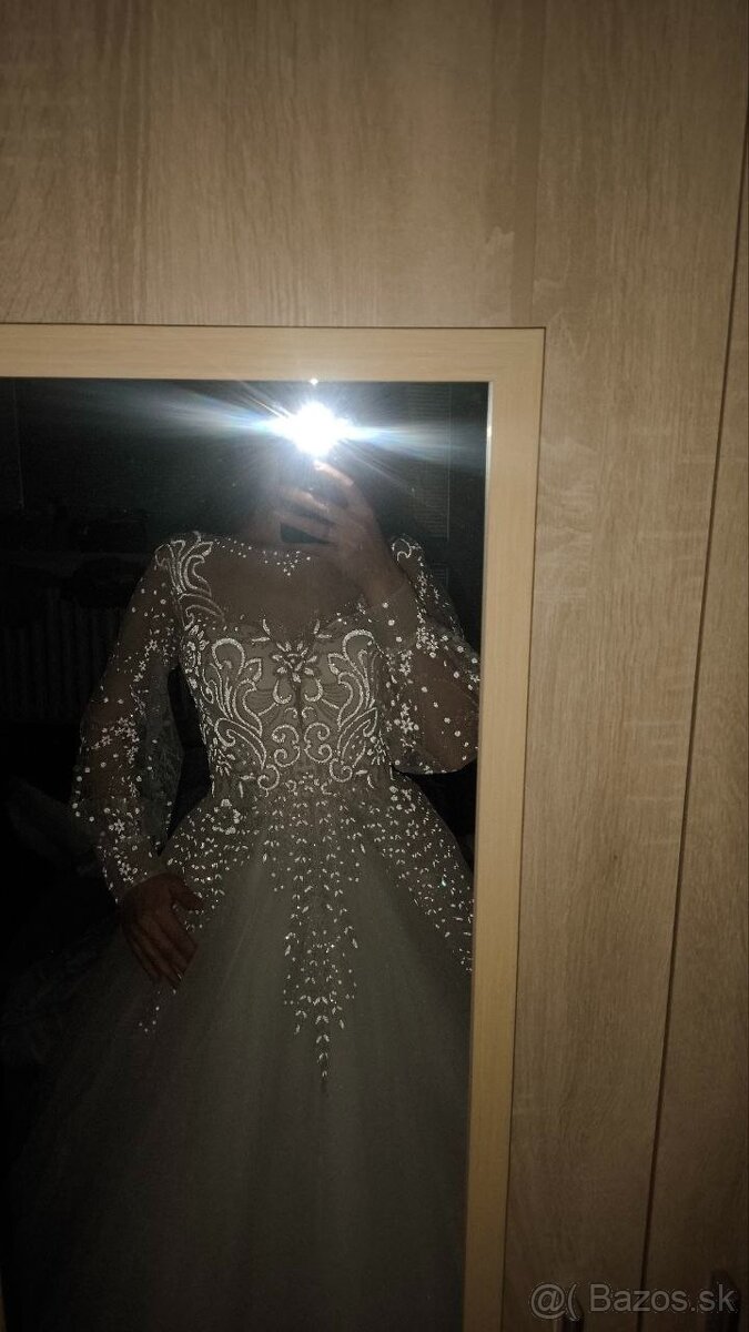 Biele nadýchané svadobné šaty