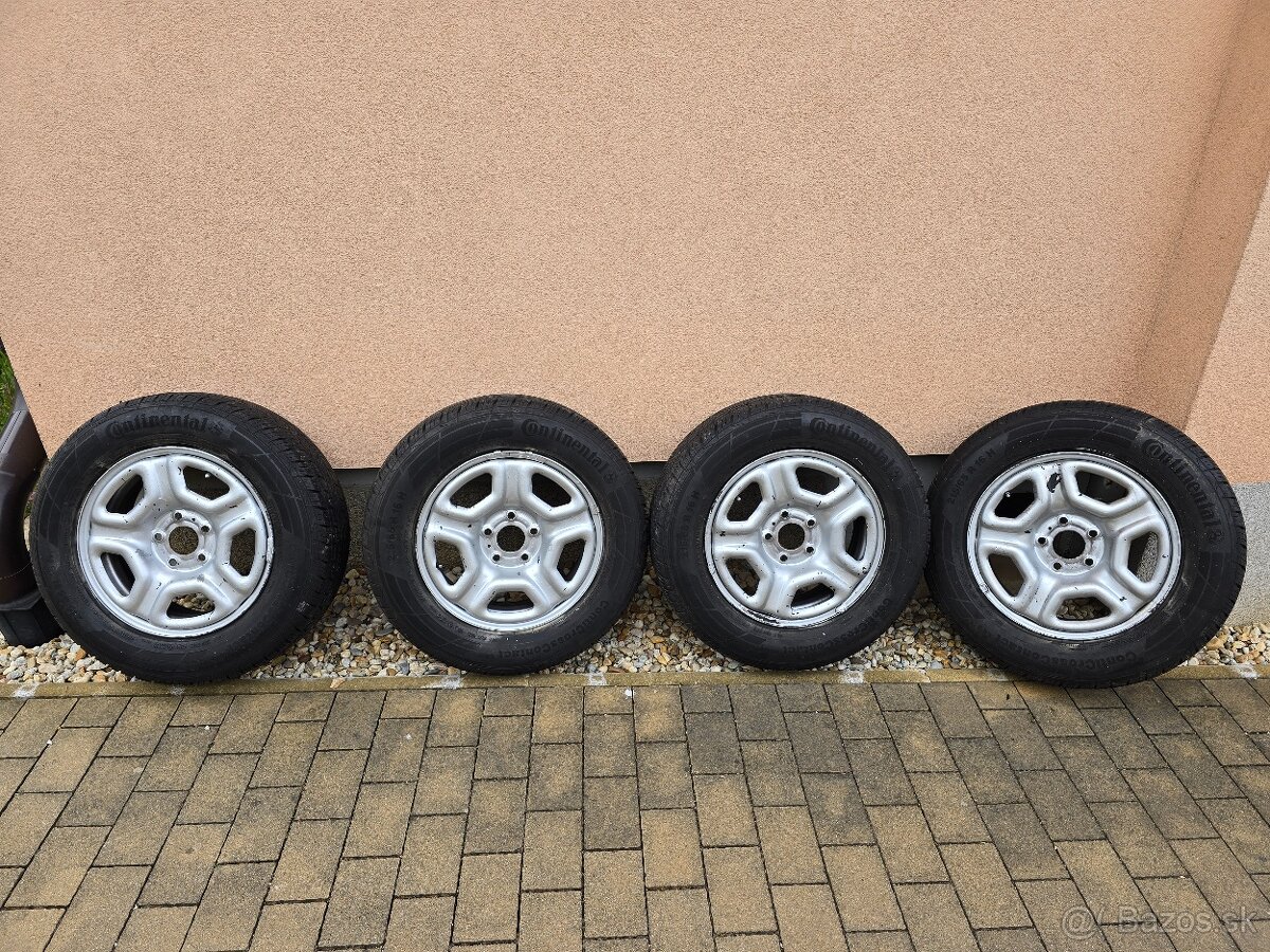 Predám disky na Daciu dasyer s pneumatikami 215-65R16