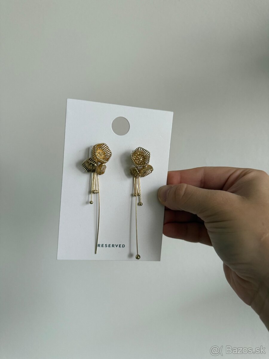 Zlaté visiace náušnice Reserved