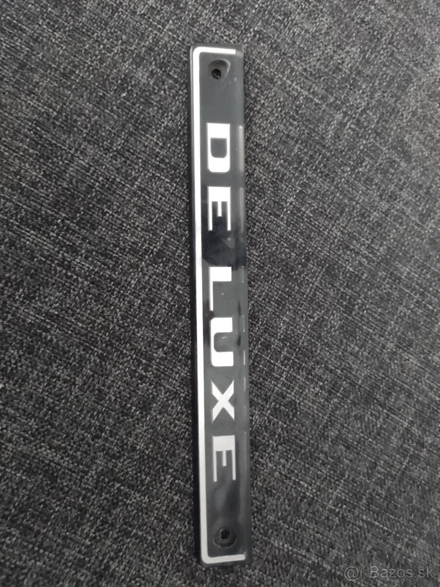Znak DELUXE