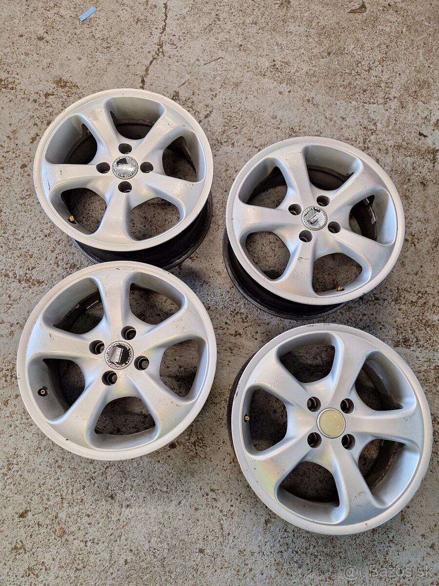 Alu disky 4x100 r15.