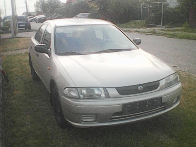 Mazda 323 1,5 benzin 65 KW