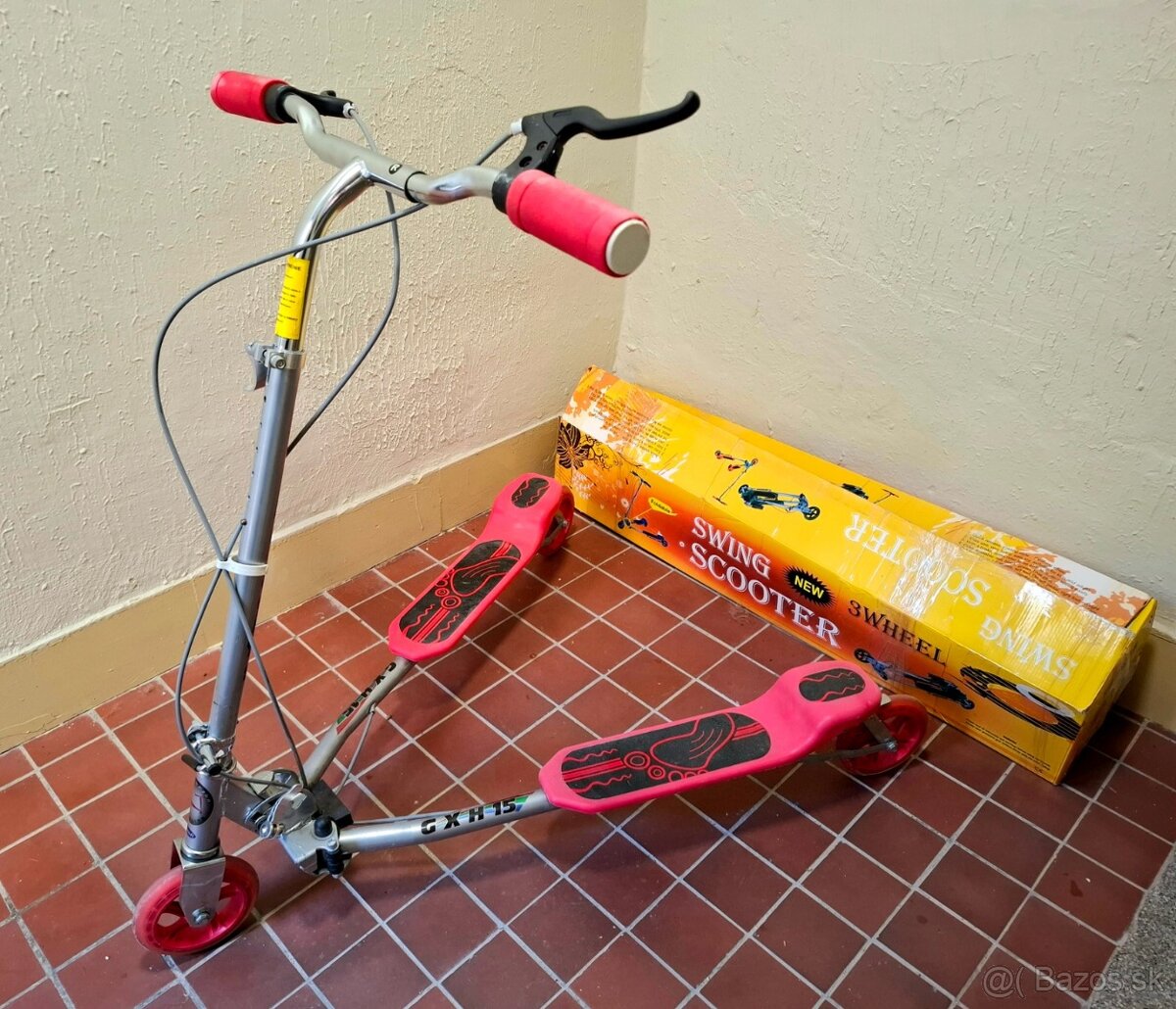 Trojkolesová kolobežka