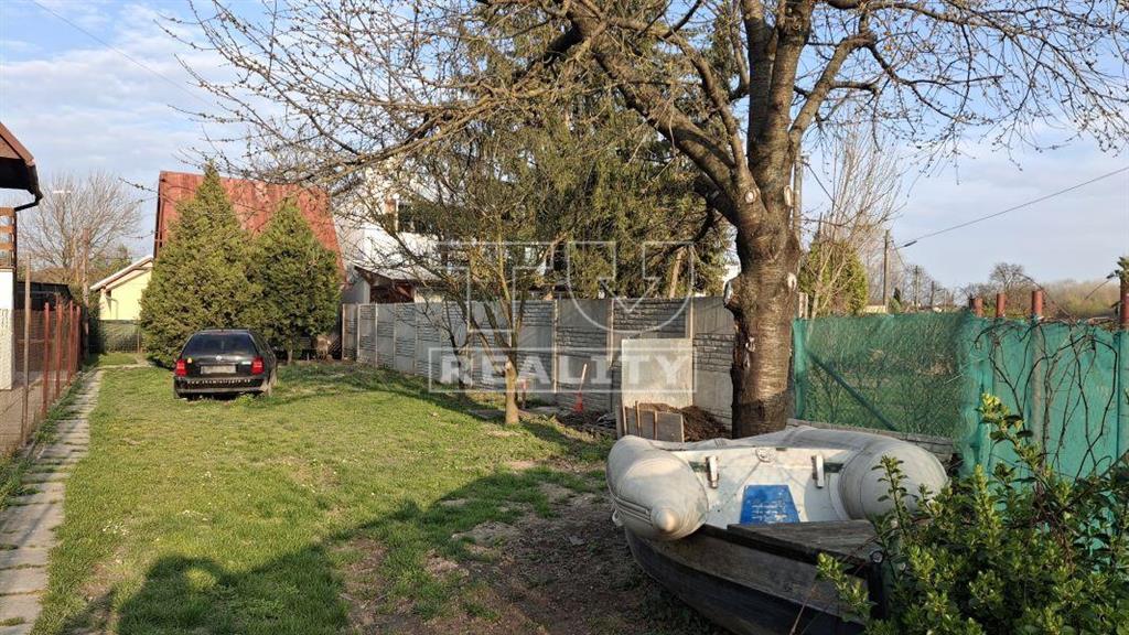 Záhrada s výmerou 2,8 ára s chatkou 25 m2 v blízkosti...